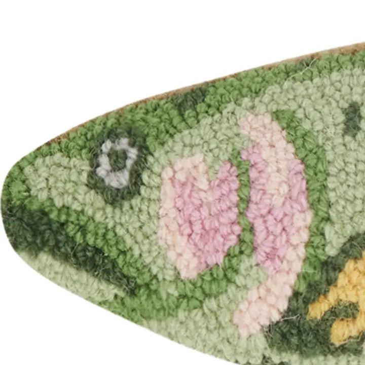 close up on the trout face to show the loopy texture of the wool hook textile.