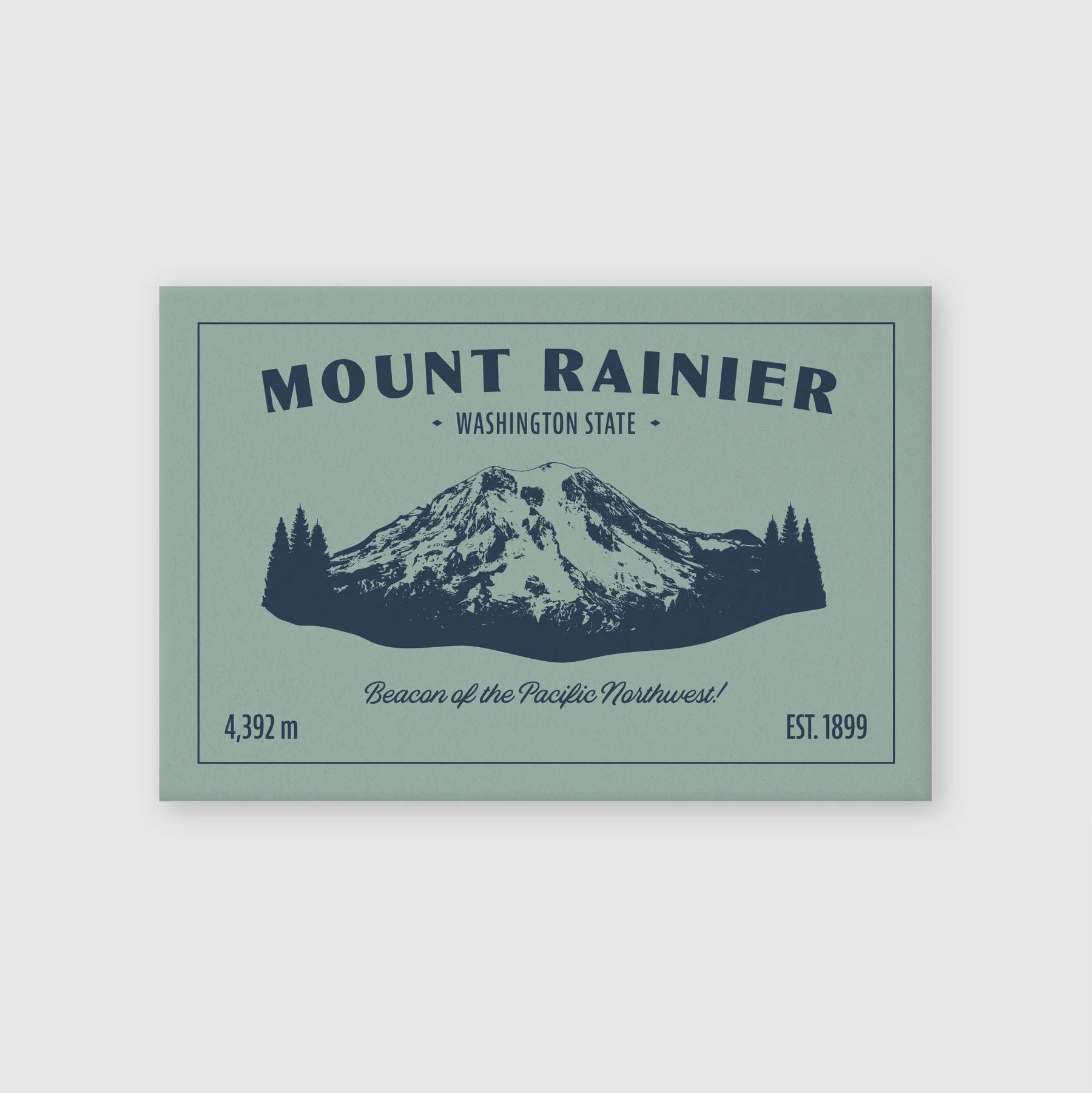 Vintage image of Mount Rainier on a slate gray postcard