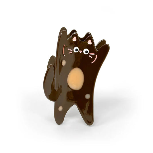 Cat shaped claw hair clip in brown. Cat is stretching to show off its tan belly
