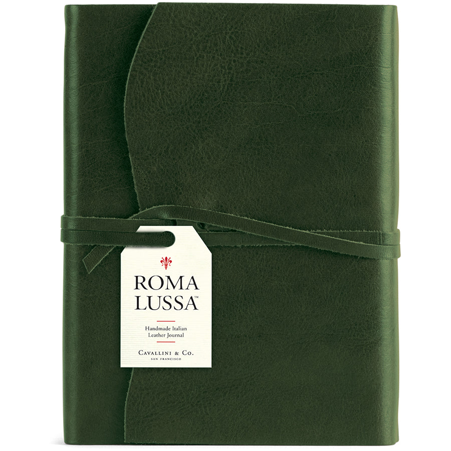 Green leather journal with 'Roma Lussa' label 