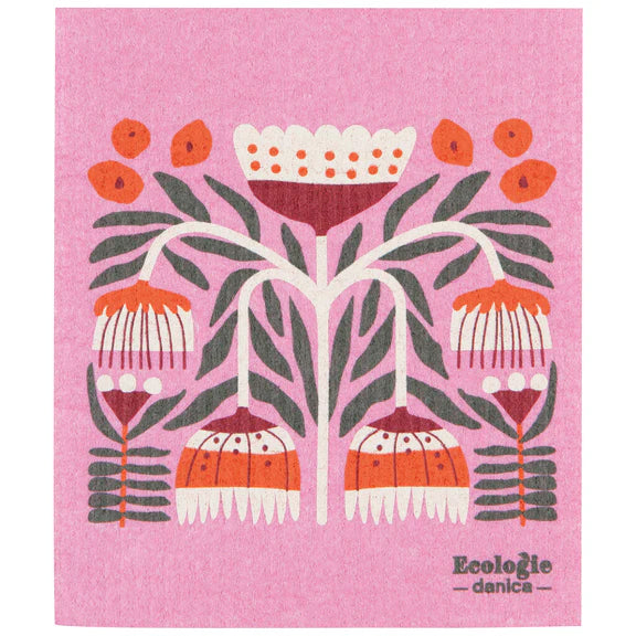 Pink reusable sponge cloth with a Scandinavian floral design in white, red, gray, and orange