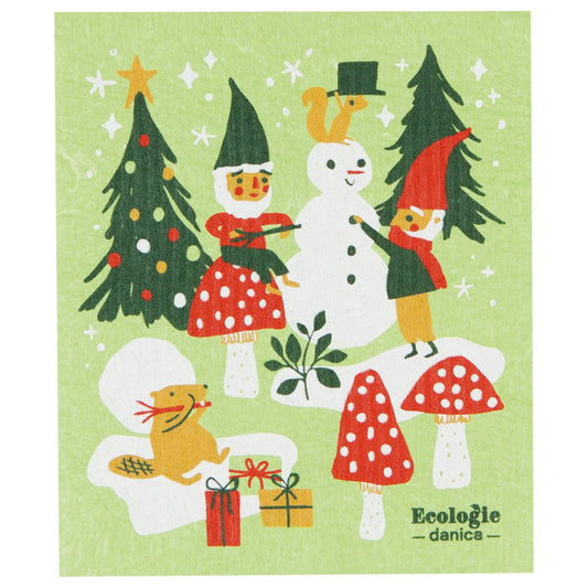Light green sponge cloth with a holiday decoration of gnomes and wildlife  with snow, decorated fir trees, mushrooms, and a snowman