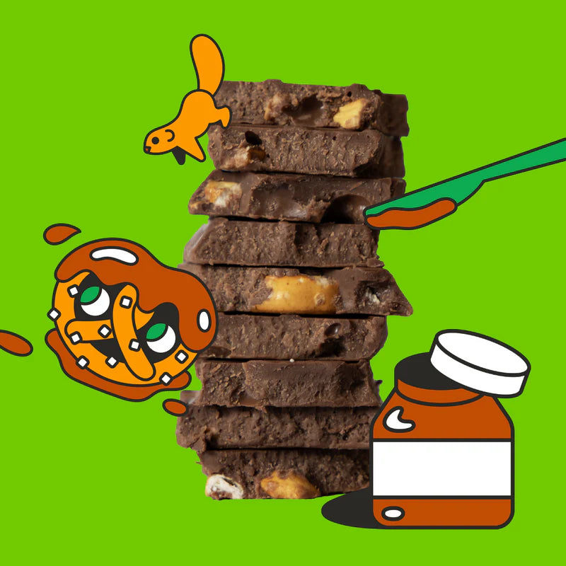 Inside detail of the candy bar shows lots of chocolate and pretzles.