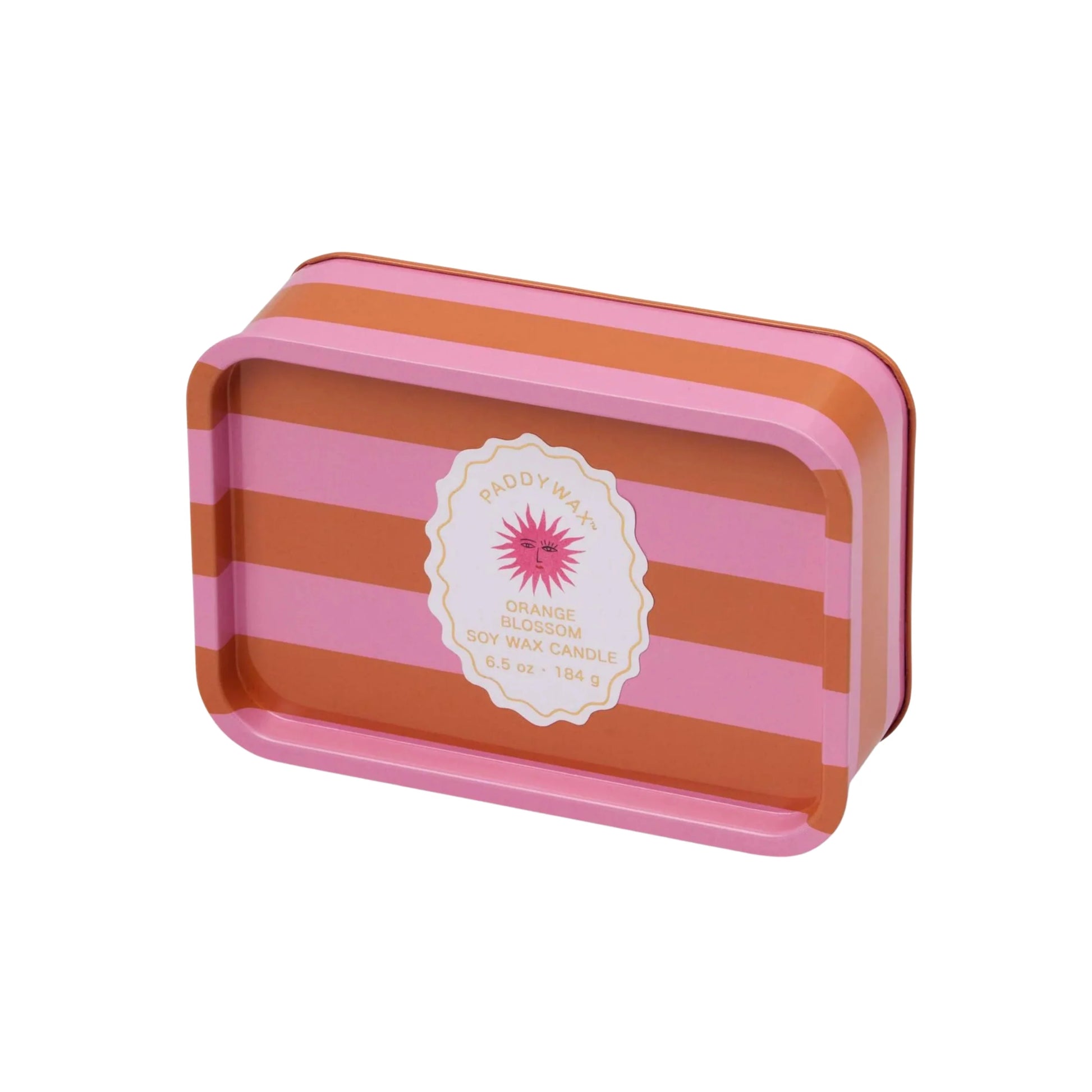 Pink and orange striped tin with white label. The label has a pink sun on it and says Paddywax, Orange Blossom Soy Wax Candle, 6.5 oz - 184 g