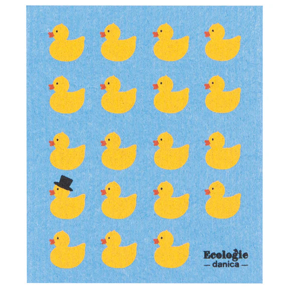 Blue reusable sponge cloth with rubber ducks all over, one duck wears a top hat