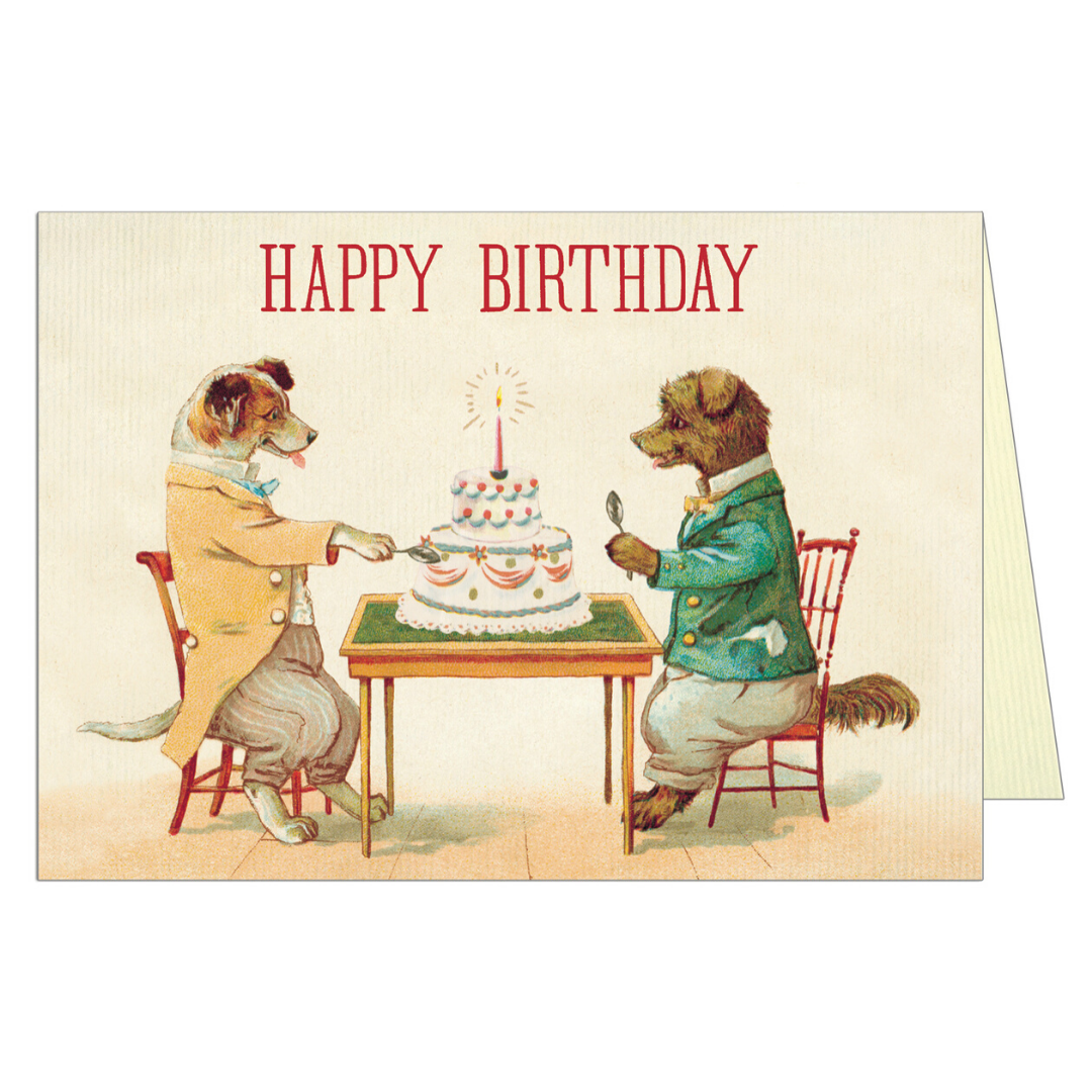 Vintage birthday card featuring two dogs sitting across a table with a cake on it
