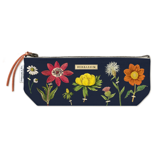 Pouch with floral design and 'Herbarium' branding on a white background