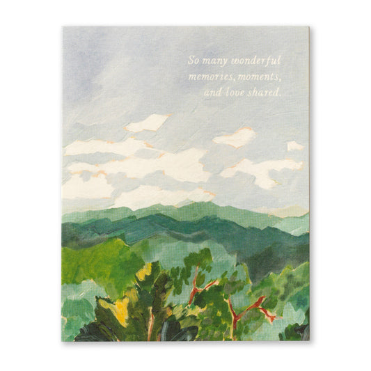 Card with mountains and sky with text So Many Wonderful Memories, Moments, and Love Shared