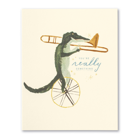 Illustration of a crocodile riding a unicycle with text on a beige background